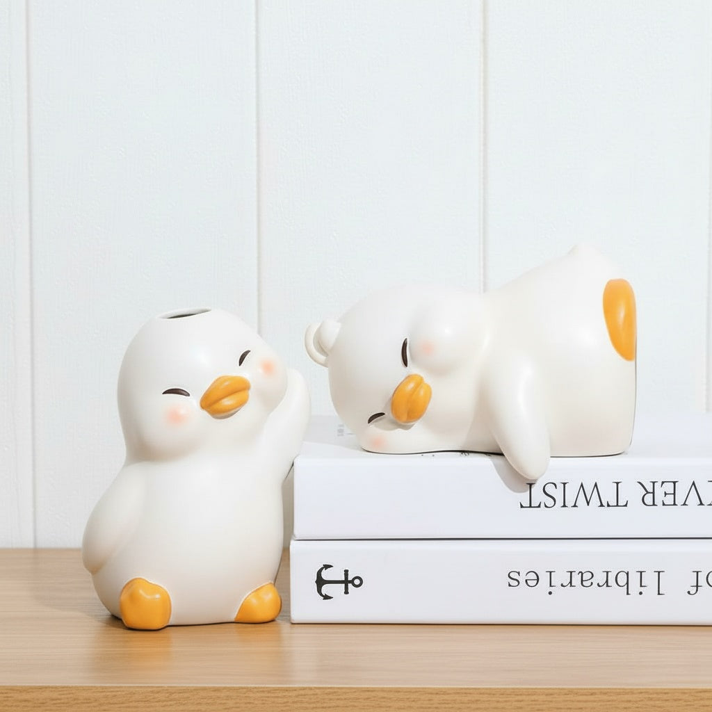 Matte White Resin Duck Bookends Resting