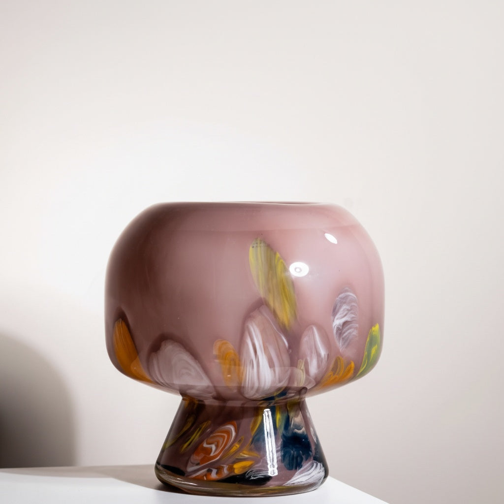 Large wide mauve glass pedestal vase with colorful swirls