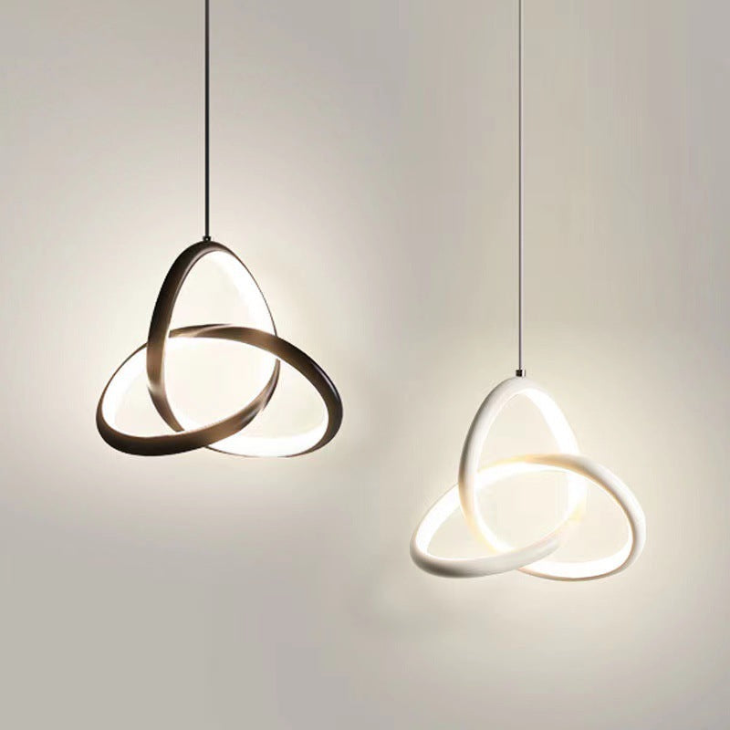 Modern metal interlocking loop pendant light with warm LED glow