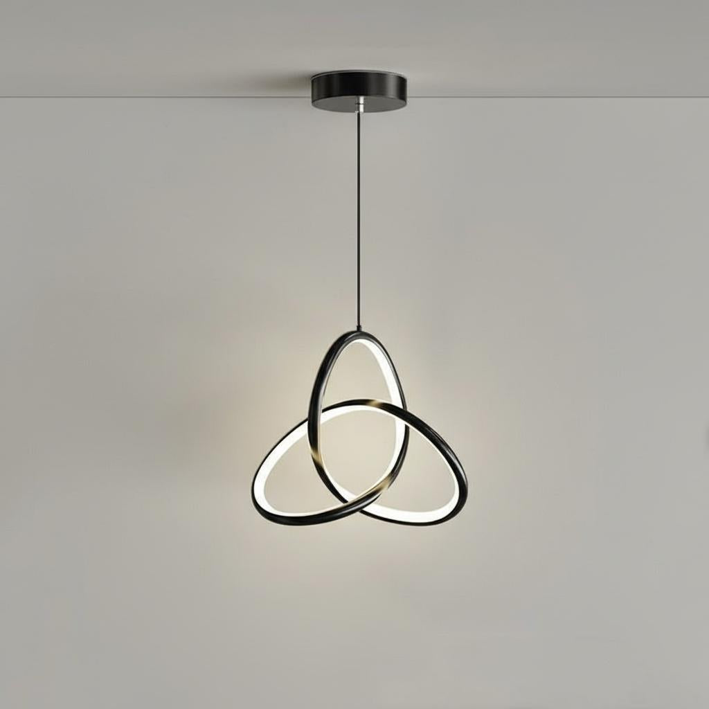 Minimalist white LED loop pendant against grey wall