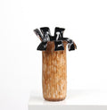Large amber ceramic vase with black sculptural rim front view