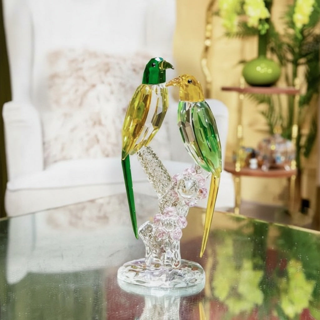 Angled view of green and yellow K9 crystal parrot figurine