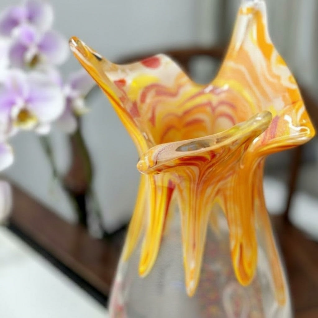 Close up detail of the organic fluted amber rim of the glass vase