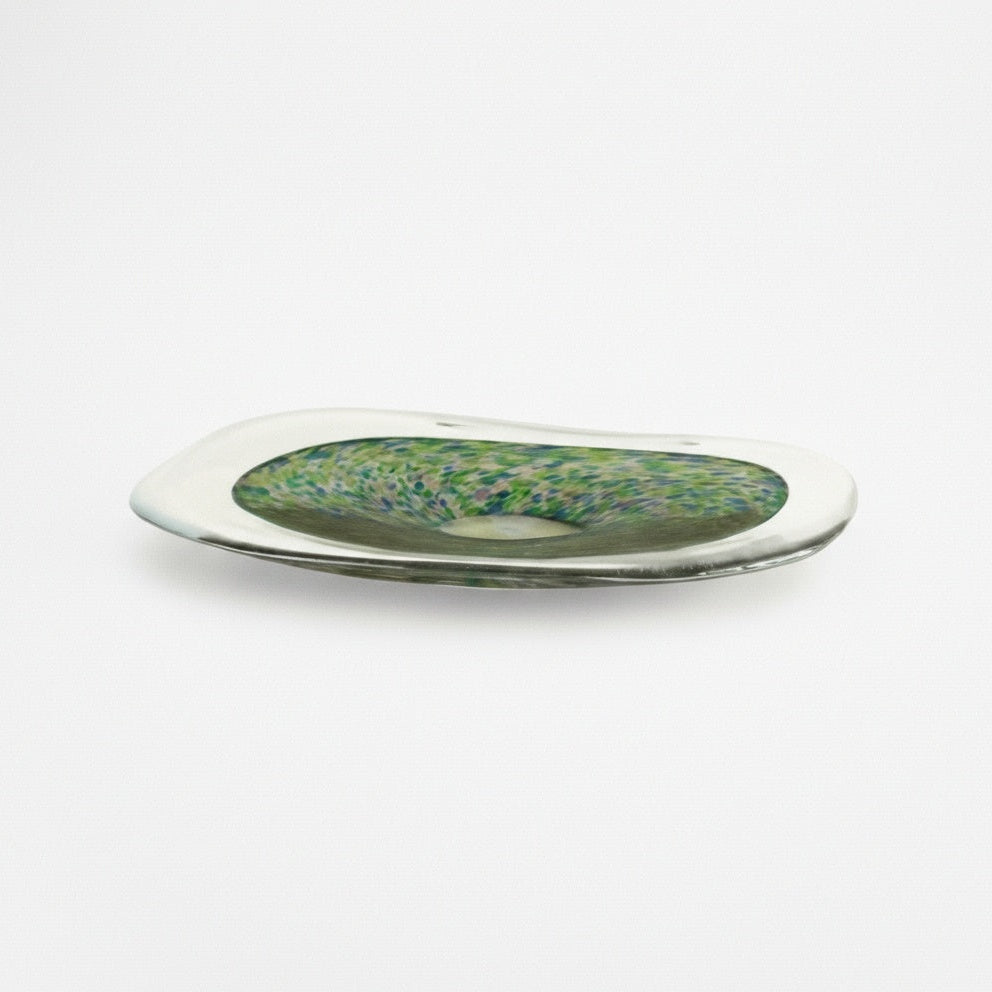 Side view of multicolor art glass platter showing organic rim