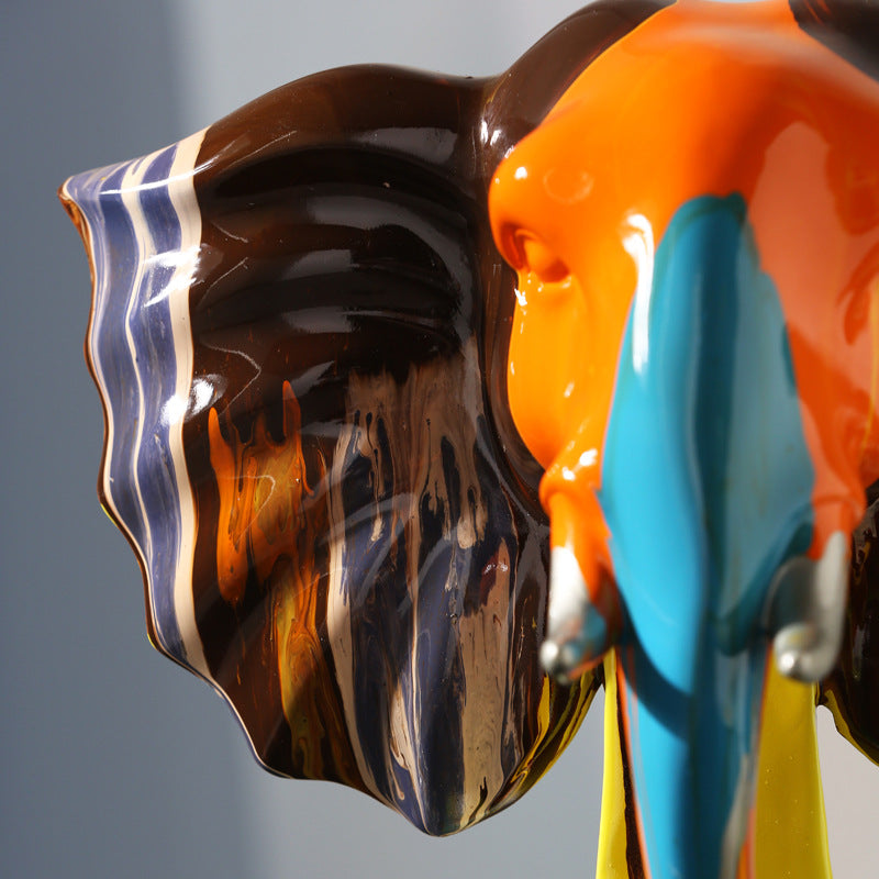 Close up detail of the glossy drip paint finish on the elephant ear