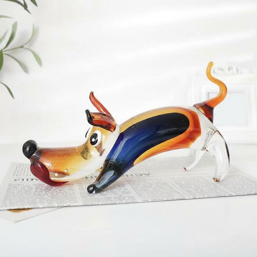 Angled view of glass dog figurine showing amber and blue colors