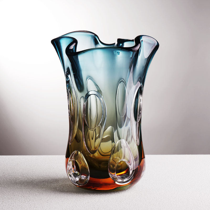 Angled view showing the organic wavy rim and blue to amber gradient