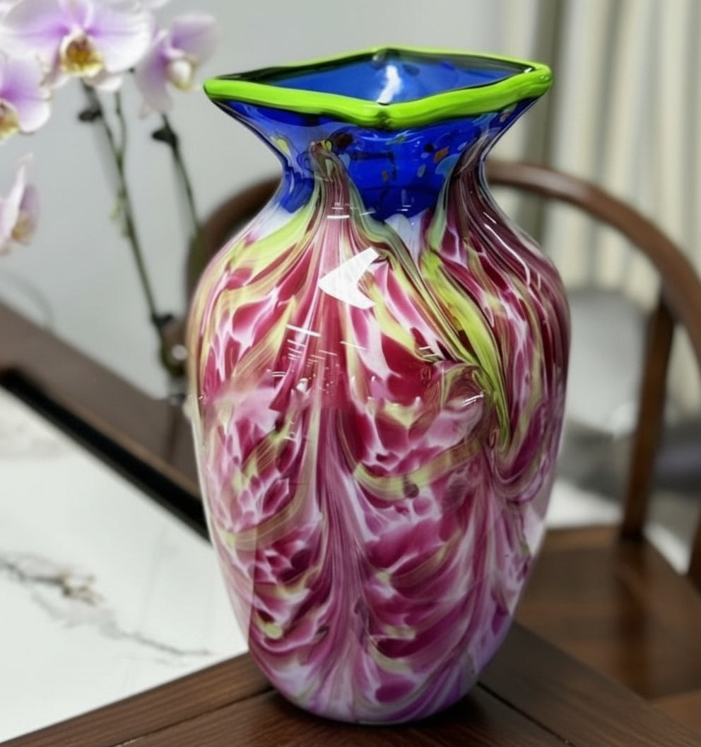 Detail view of multicolor art glass vase on table
