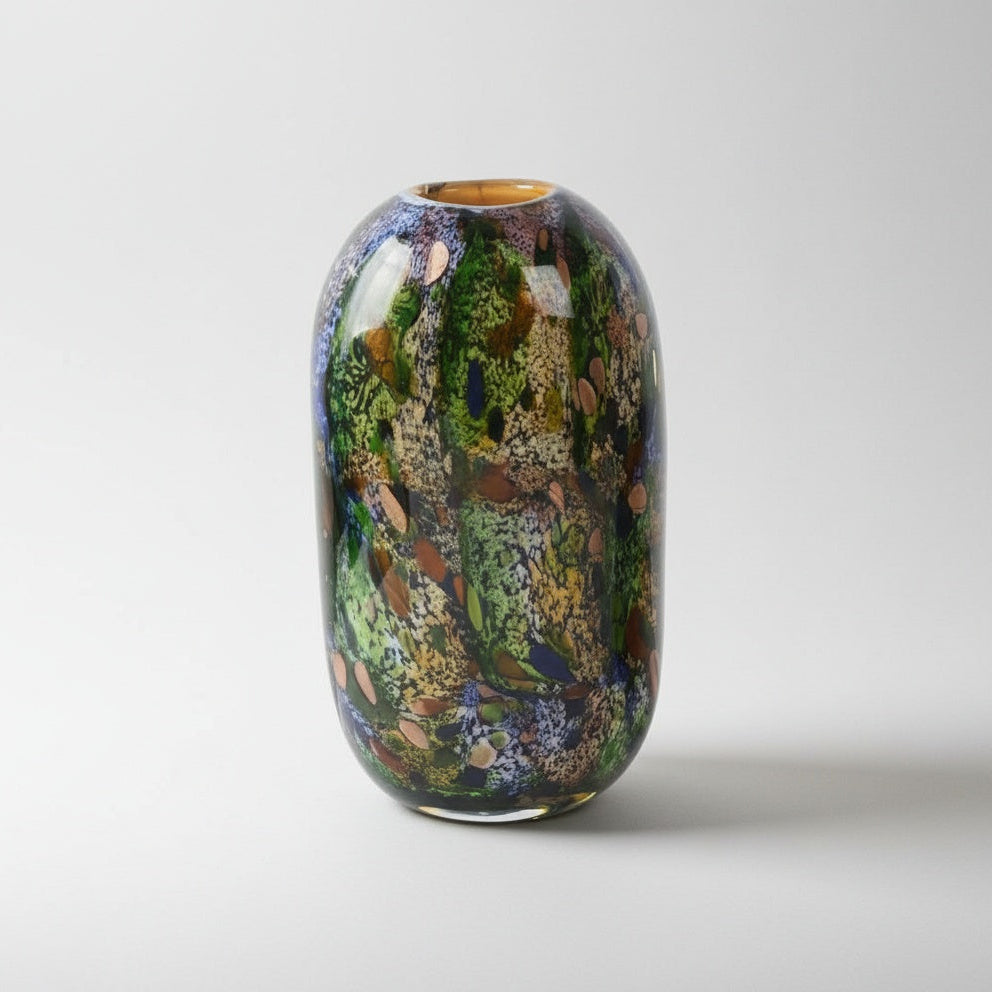 Front view of multicolored art glass cylindrical vase