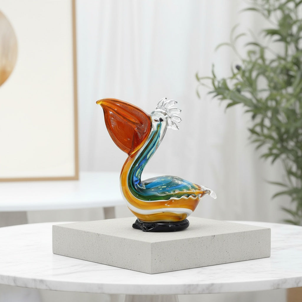 Side profile of multicolored glass pelican figurine