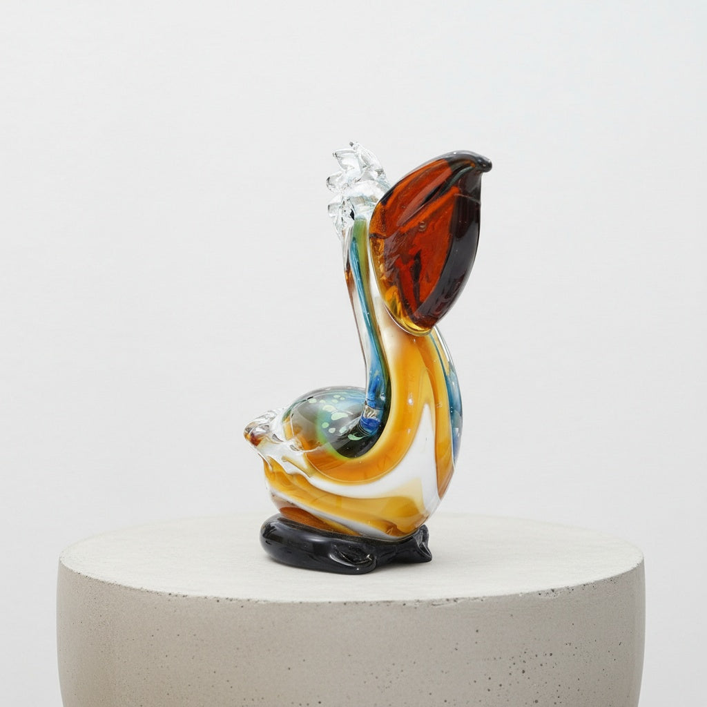 Back angle view of colorful art glass pelican