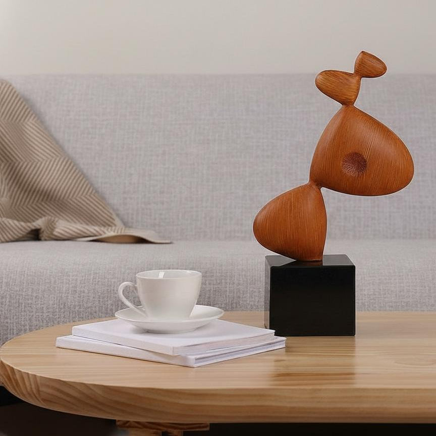 Lifestyle shot of sculpture on coffee table in modern living room