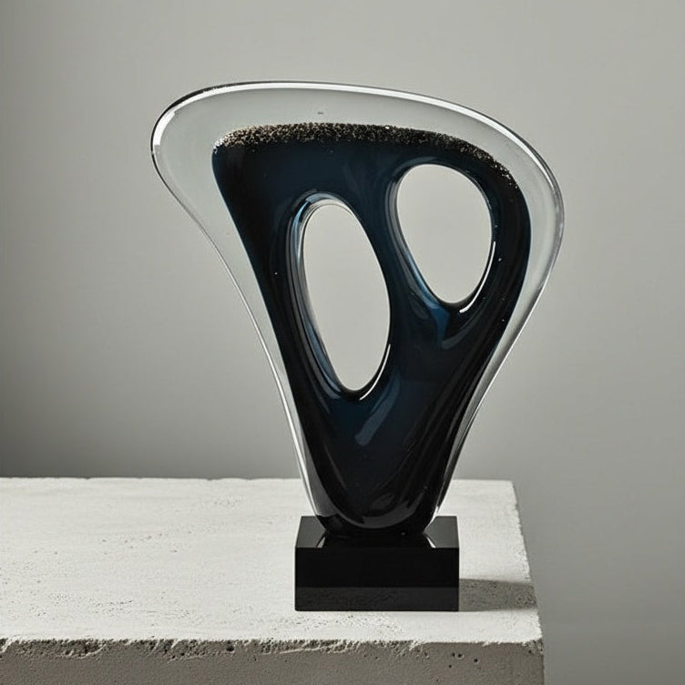Medium navy blue glass sculpture with organic hole