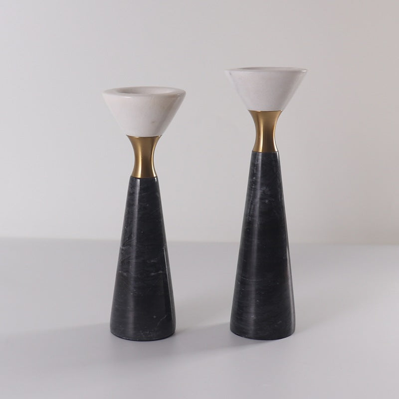 Pair of geometric marble candle holders side by side