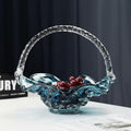 Front view of blue art glass fruit basket with ruffled rim