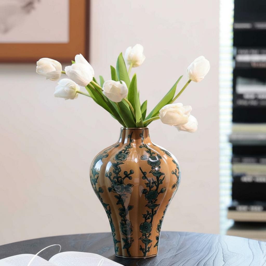Angled view of fluted ceramic vase with floral pattern