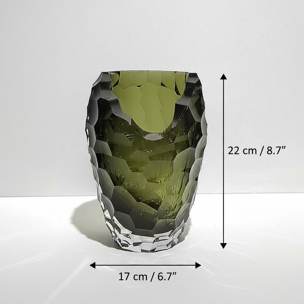 Close up of medium olive green faceted vase