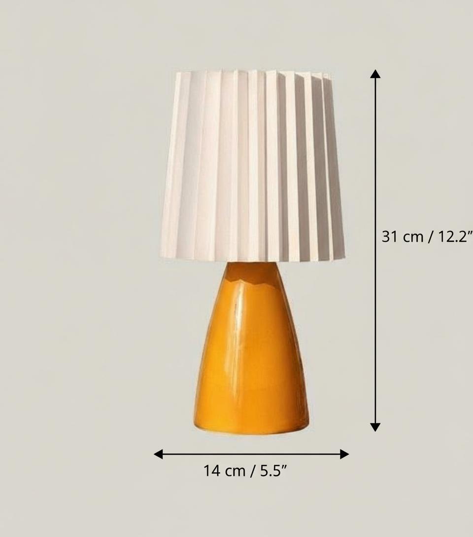 Dimensions diagram of orange ceramic table lamp showing height and width