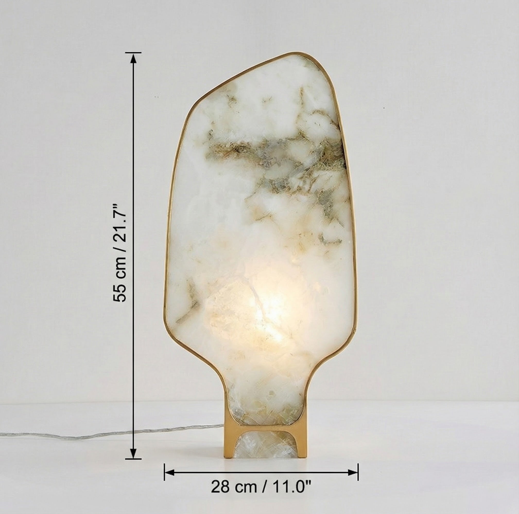 Technical diagram showing dimensions of marble and brass table lamp with 55cm height and 28cm width
