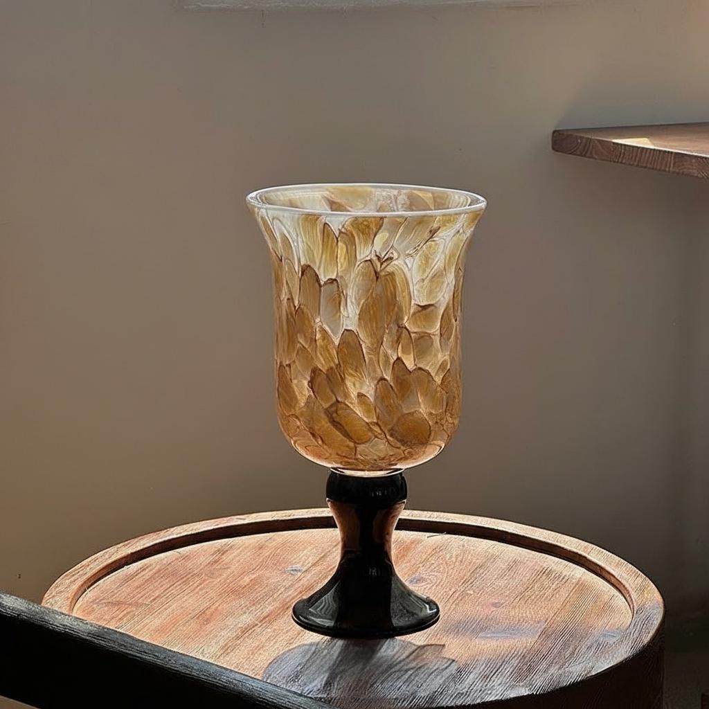 Empty brown art glass vase front view