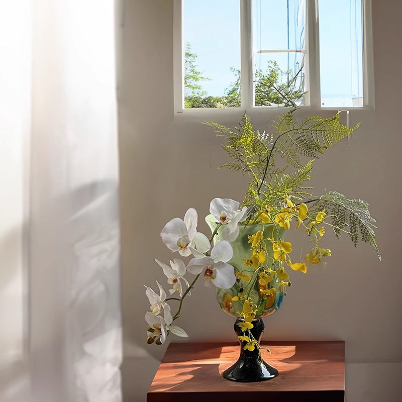 Detail view of patterned glass vase