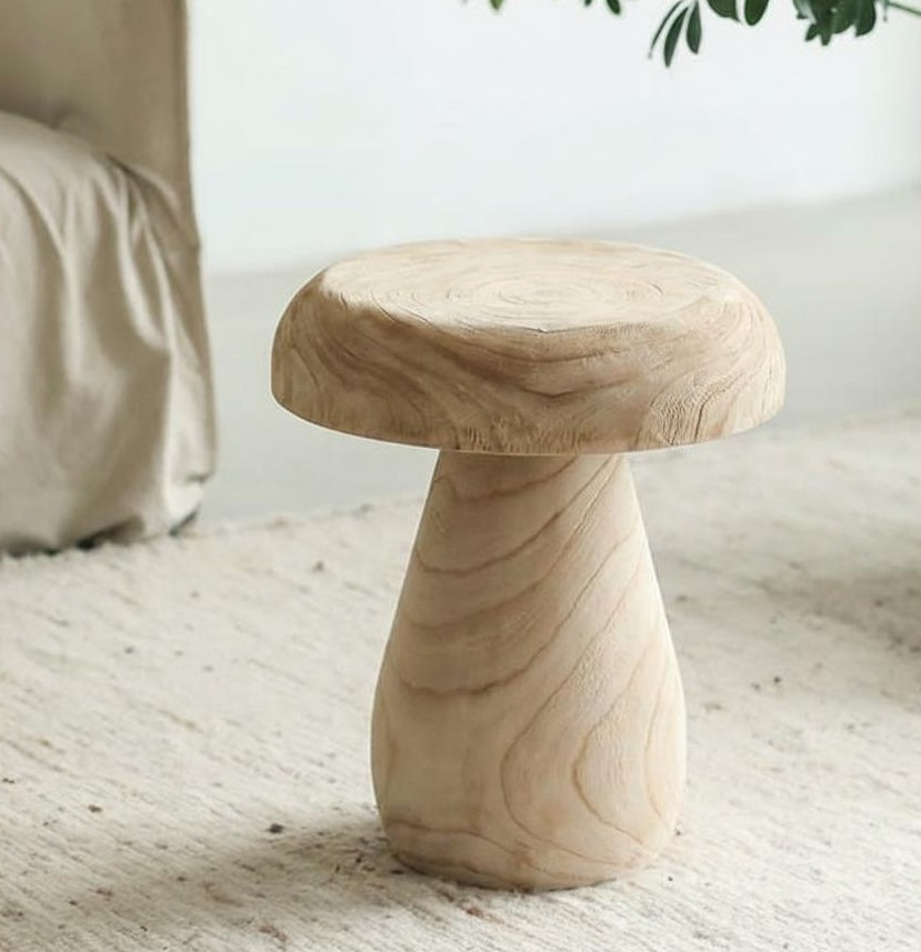 Angled view of large wooden mushroom side table