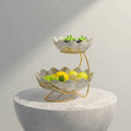 Two-tier pearlescent ceramic fruit bowl with fruit