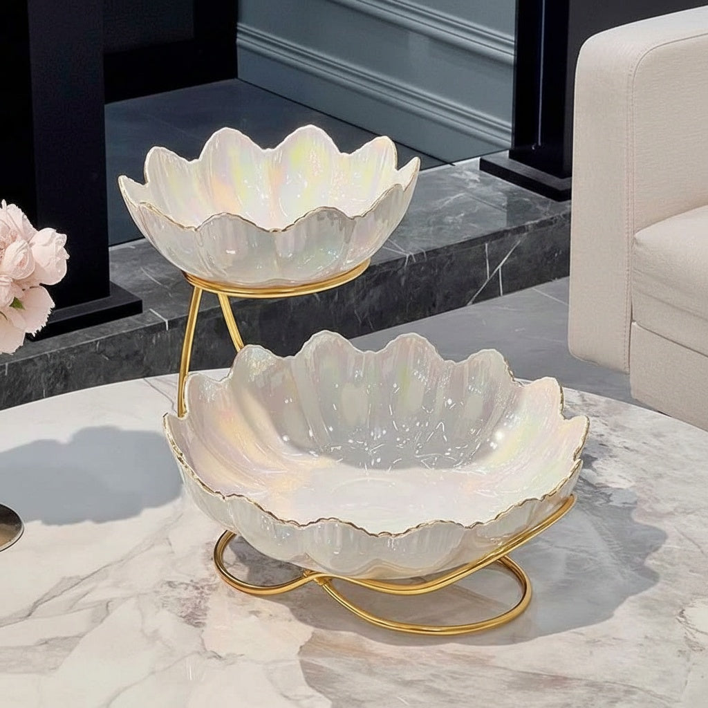 Empty pearlescent ceramic lotus bowls on gold stand