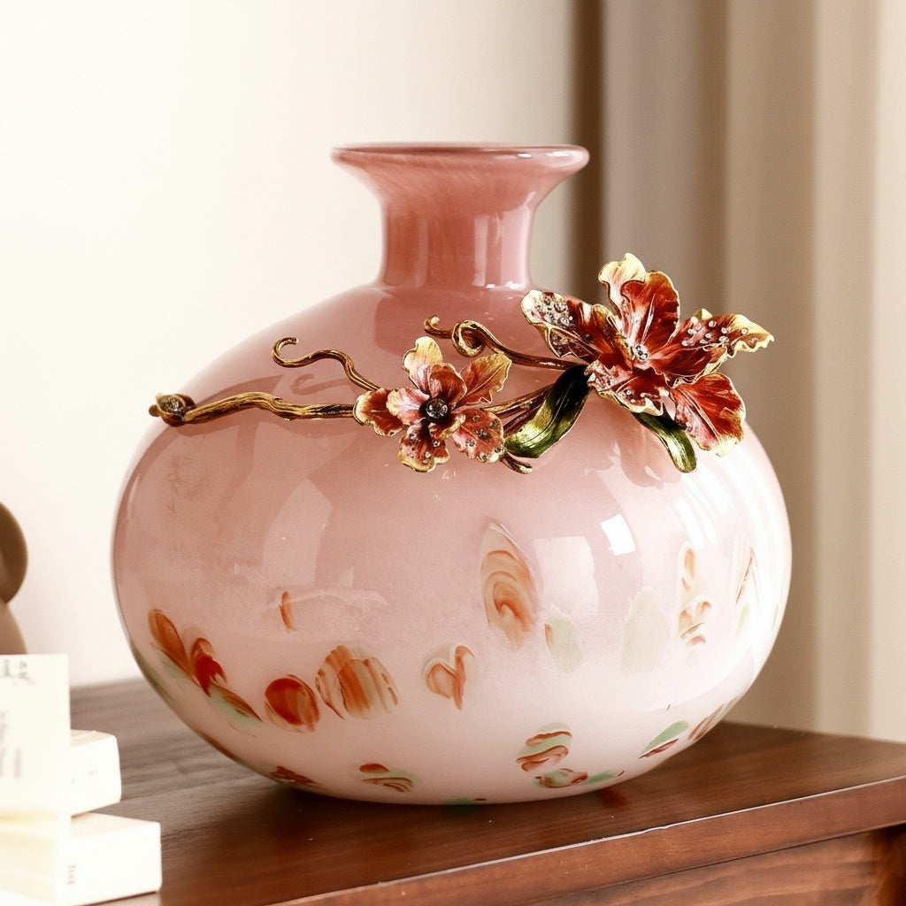 Pink art glass vase with enamel flower detail front view