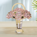 Front view of pink crystal flower basket figurine on table