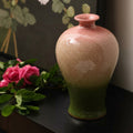 Full view of pink to green gradient glazed vase