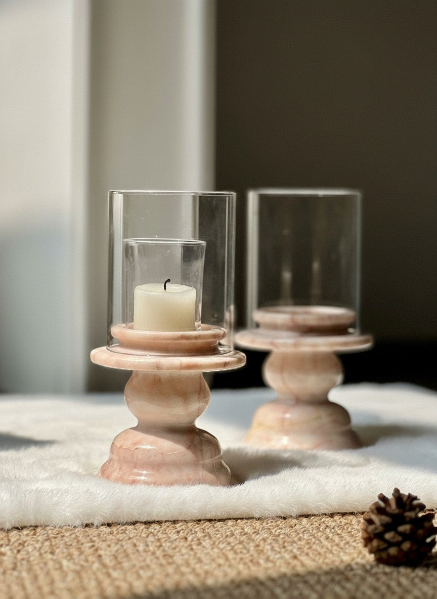 Pink marble candle holder centerpiece on white texture