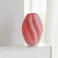 Large pink swirled glass vase detail