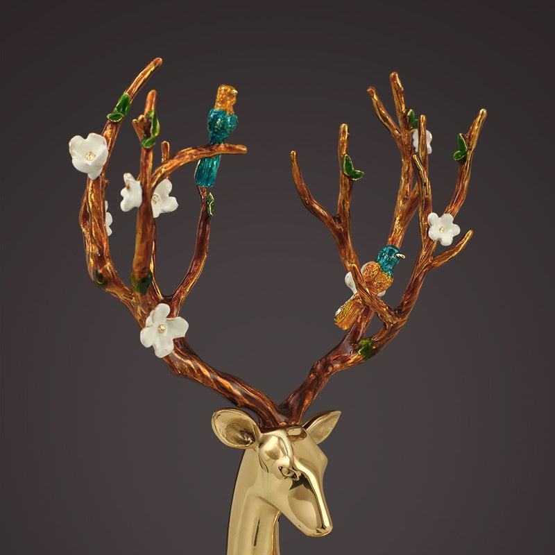 Detail shot of deer head and floral antler design