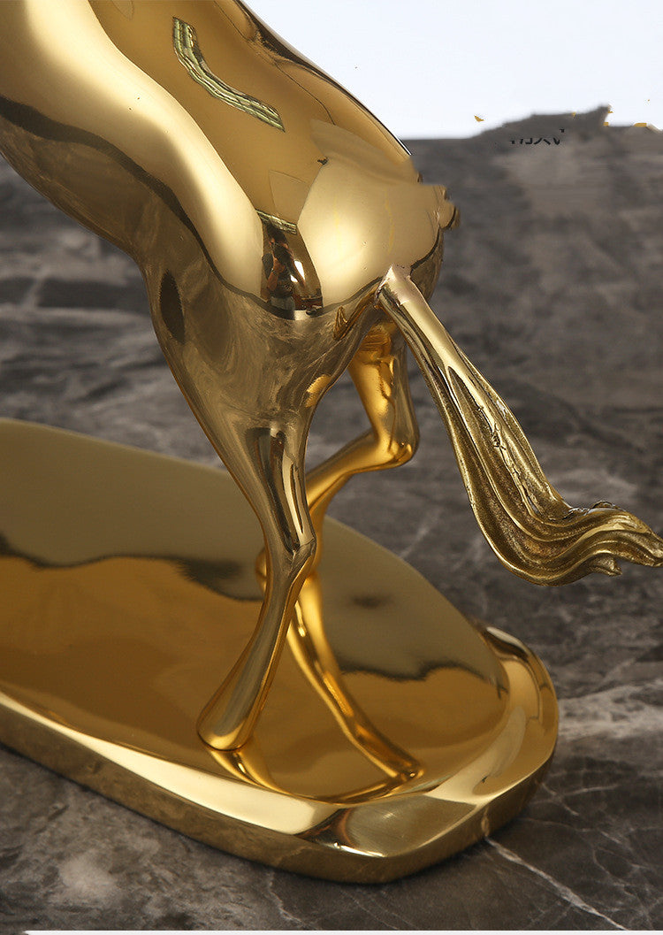 Detail of polished gold copper horse tail and base