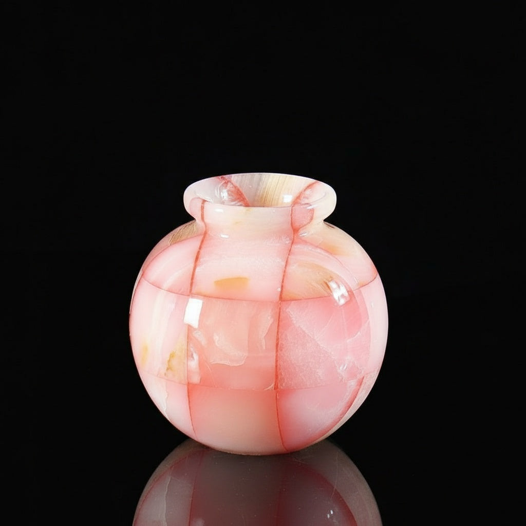 Close up of pink translucent mosaic round vase
