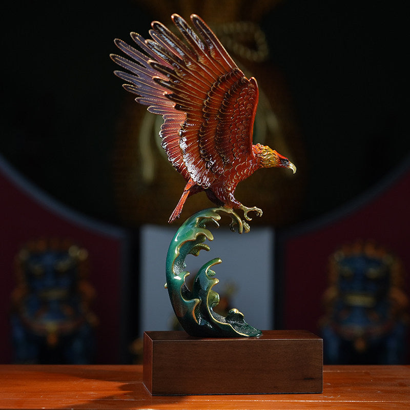 Side profile of copper eagle sculpture on wave