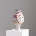 Front view of polychrome speckled ceramic vase
