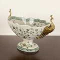 Angled view of floral porcelain bowl with copper accents