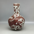Front view of the porcelain dragon motif bottle vase
