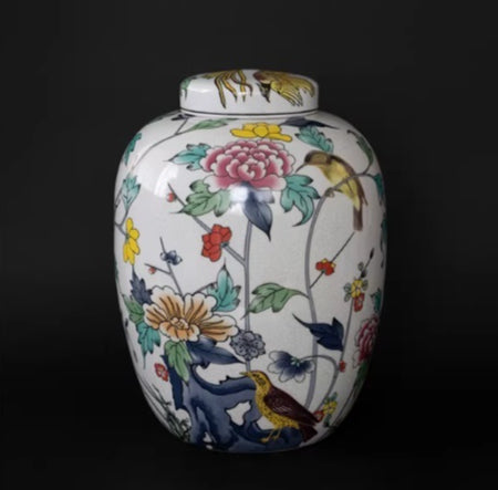 Front view of porcelain ginger jar with floral and bird pattern