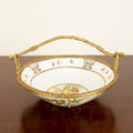 Front view of porcelain and gilt brass centerpiece bowl