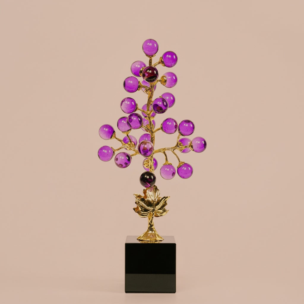 Front view of the purple glass and gold branch decorative object