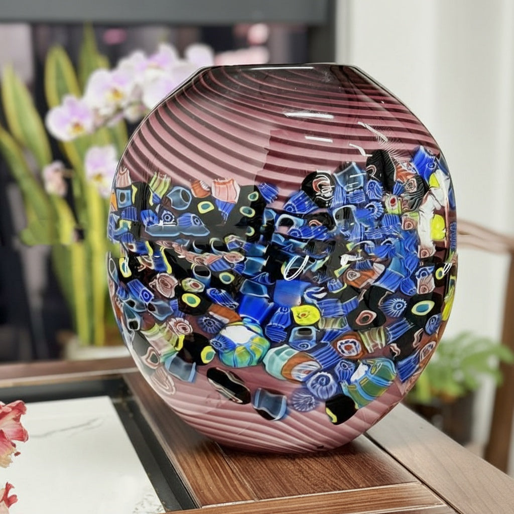 Angled view of round purple glass vase showing texture
