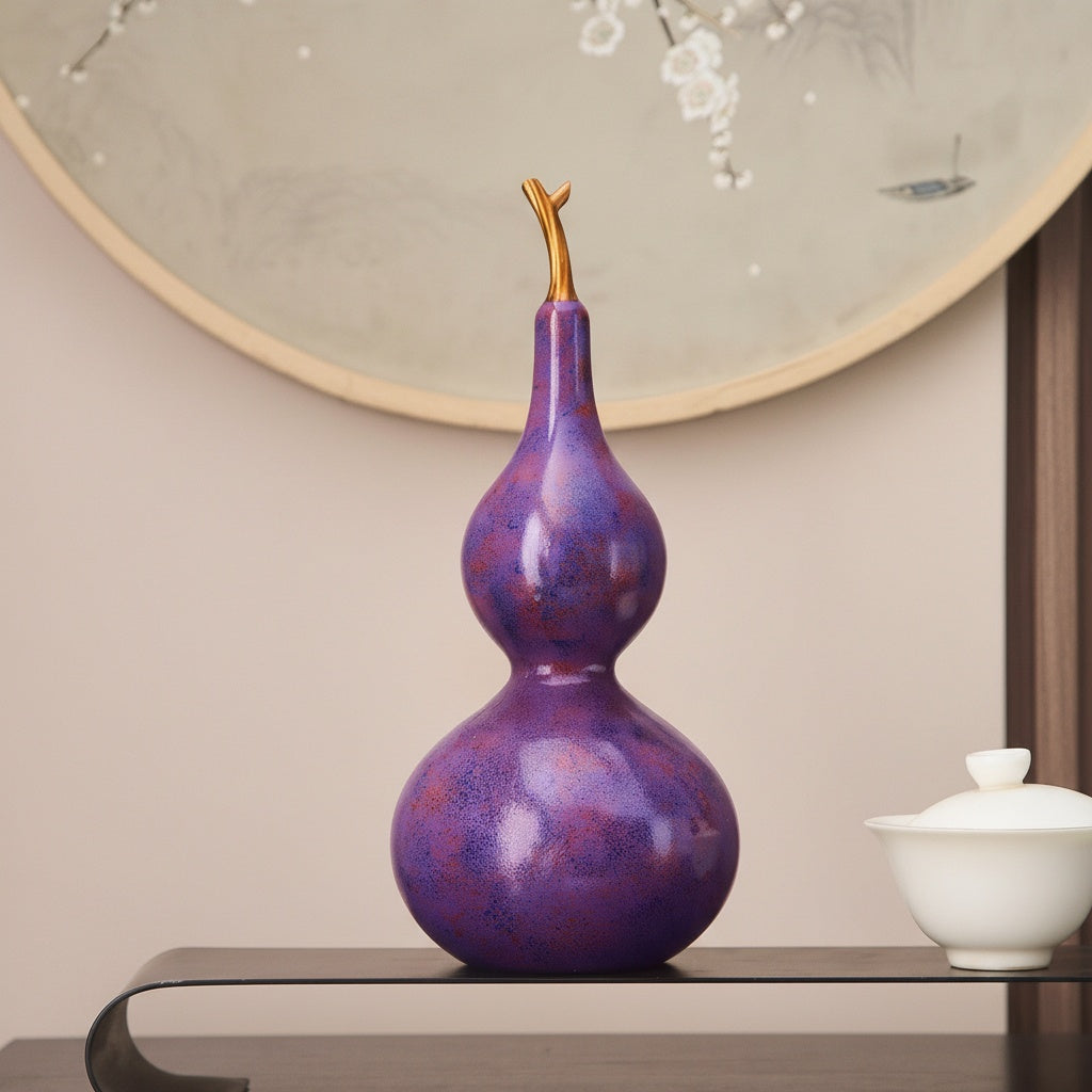 Front view of purple speckled calabash ornament