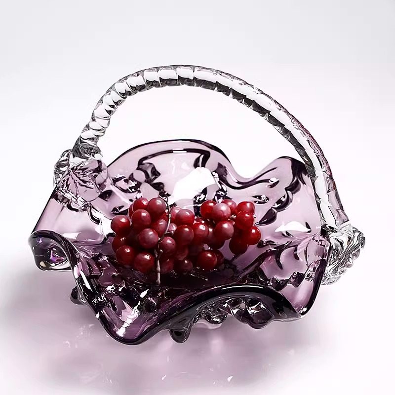 Purple stained glass basket bowl with fresh grapes