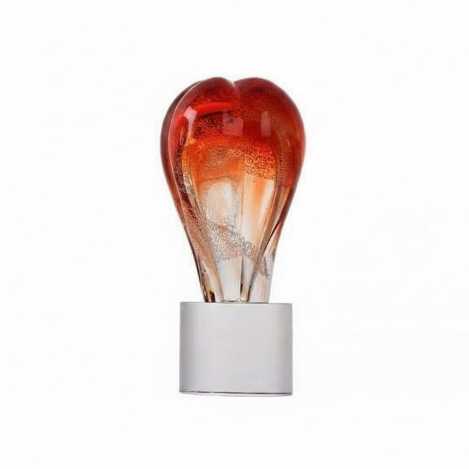 Front view of abstract red glass sculpture