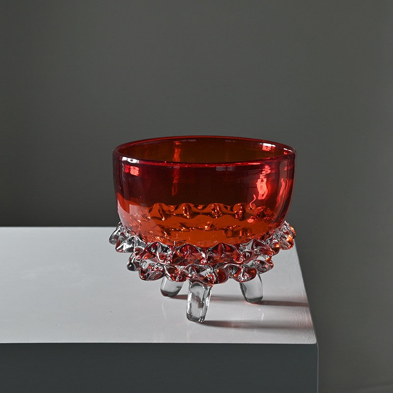 Red glass footed bowl with textured clear base