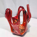 Red and black swirl art glass bowl front view