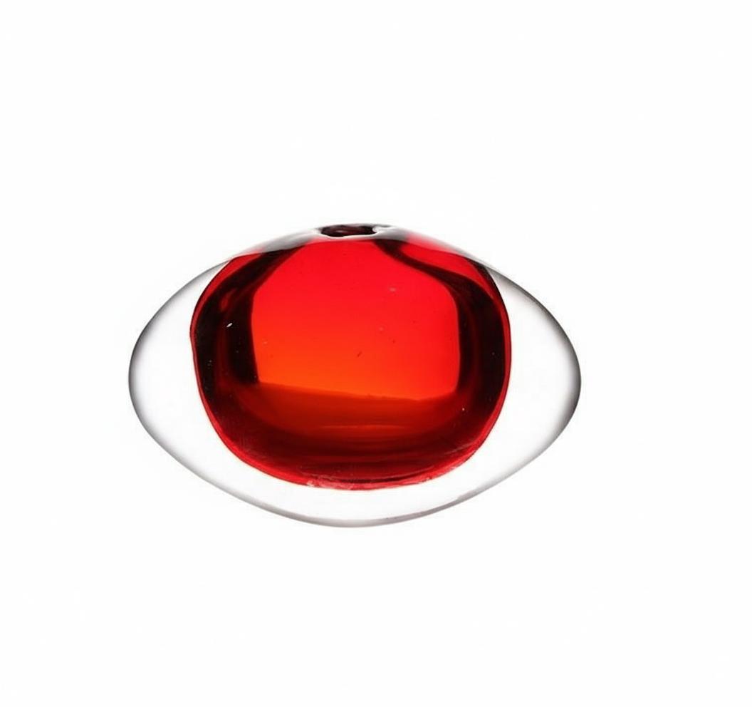 Top down view of red core inside clear glass vase
